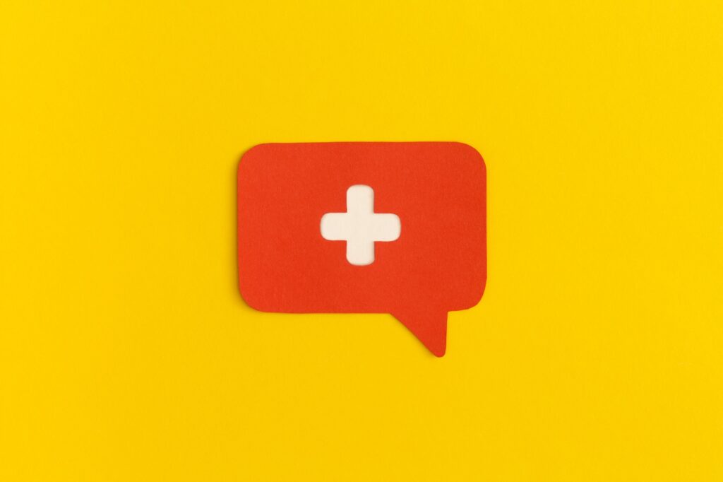 Masseymediait.com | Your East Texas It Partner 11 Medicine Cross On A Yellow Background. Health And Medical Treatment Concept.