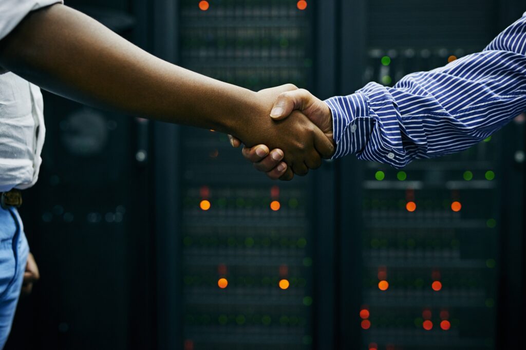 Proactive It Services In Lufkin, Tx 1 East Texas It Services | Paired Up For Professional It Service. Cropped Shot Of Two Men Shaking Hands In A Data Center.